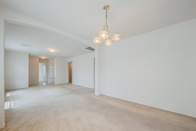 427 Sunset Colony Dr, Rosharon, TX 77583 - empty room featuring light carpet and a chandelier