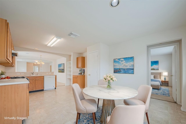 427 Sunset Colony Dr, Rosharon, TX 77583 - dining space with a chandelier