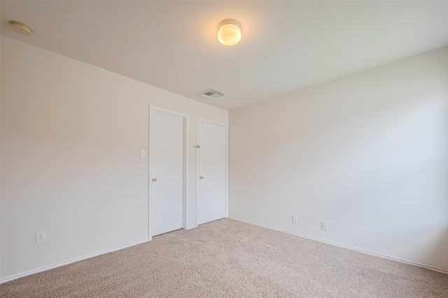 427 Sunset Colony Dr, Rosharon, TX 77583 - spare room featuring carpet flooring, a smoke detector, and baseboards