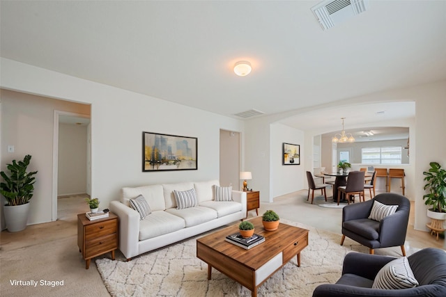 427 Sunset Colony Dr, Rosharon, TX 77583 - living area with light colored carpet and a chandelier