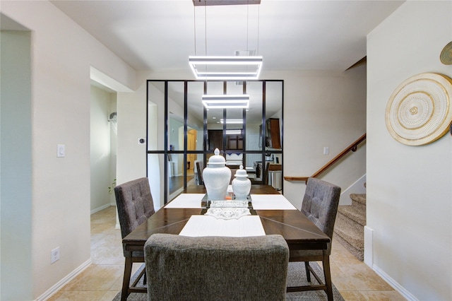223 Summer Gate Ct, Rosenberg, TX 77469 - dining space featuring stairs and light tile patterned floors