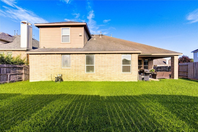 223 Summer Gate Ct, Rosenberg, TX 77469 - rear view of property with brick siding, a patio area, and roof with shingles