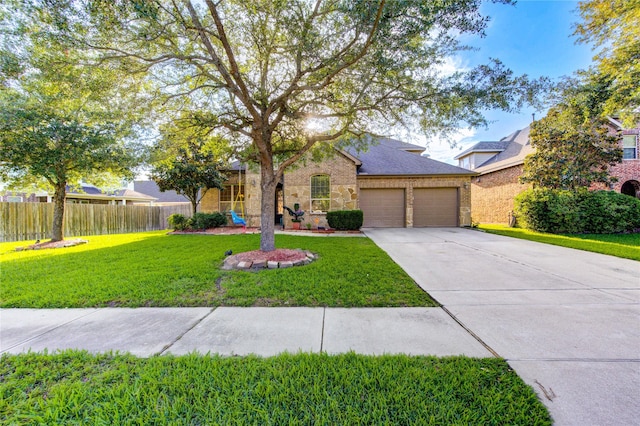 223 Summer Gate Ct, Rosenberg, TX 77469 - traditional-style house featuring a garage, concrete driveway, brick siding, and stone siding