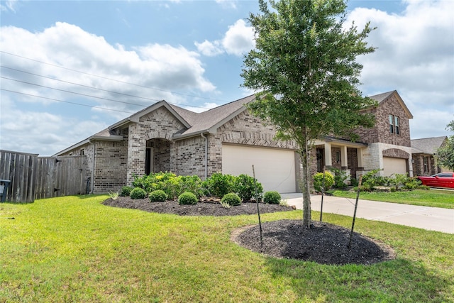 10106 Granite Grove Ln, Richmond, TX 77406 - view of front of house with brick siding, an attached garage, and concrete driveway