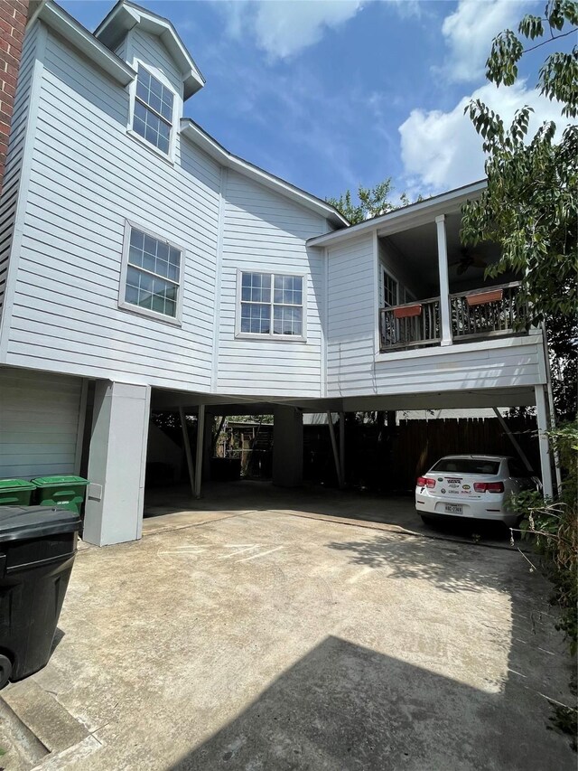 508 W Clay St, Houston, TX 77019 - view of front of property with a carport and concrete driveway