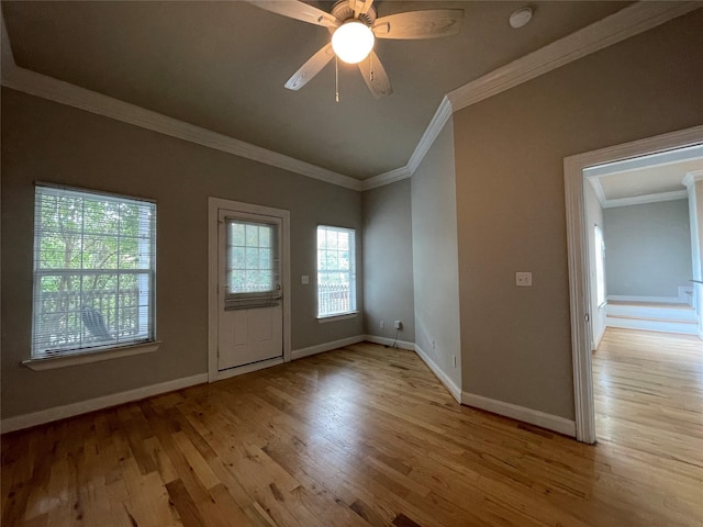 508 W Clay St, Houston, TX 77019 - empty room featuring wood finished floors, ornamental molding, baseboards, ceiling fan, and vaulted ceiling