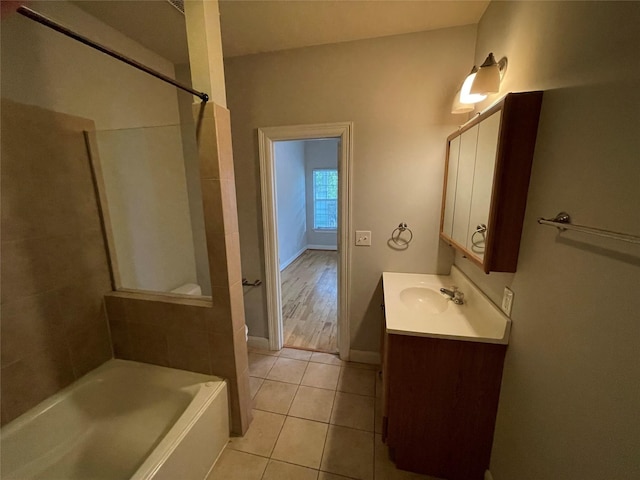 508 W Clay St, Houston, TX 77019 - bathroom featuring tile patterned floors, vanity, and baseboards