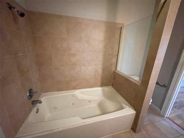 508 W Clay St, Houston, TX 77019 - bathroom with a jetted tub, tile patterned floors, and a shower