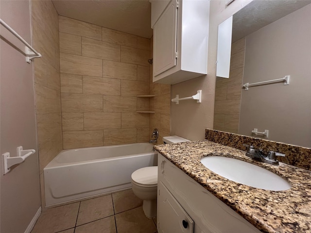 958 Grand Junction Dr, Katy, TX 77450 - full bathroom featuring toilet, tile patterned floors, vanity, and shower / bathtub combination