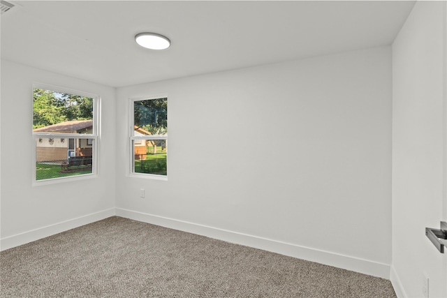 805 19th Ave N, Texas City, TX 77590 - carpeted empty room with baseboards