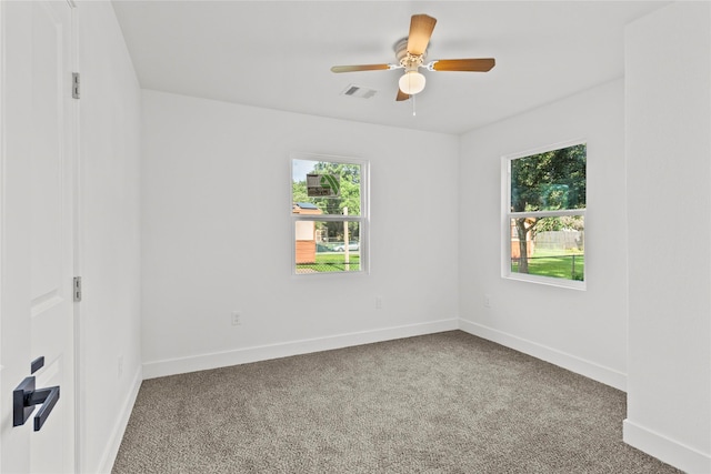 805 19th Ave N, Texas City, TX 77590 - carpeted spare room with ceiling fan and baseboards