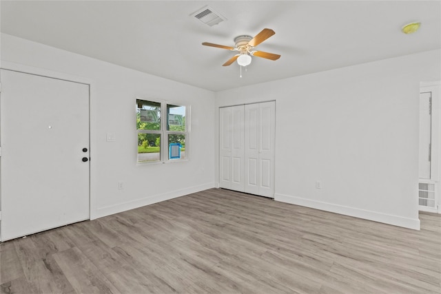 805 19th Ave N, Texas City, TX 77590 - entryway with ceiling fan, light wood finished floors, and baseboards