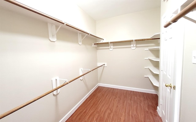 2707 Sun Beam Ct, Pearland, TX 77584 - spacious closet featuring wood finished floors