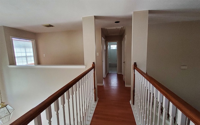 2707 Sun Beam Ct, Pearland, TX 77584 - corridor with attic access, wood finished floors, plenty of natural light, and an upstairs landing