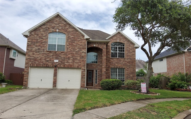 2707 Sun Beam Ct, Pearland, TX 77584 - traditional-style home featuring brick siding, a garage, and concrete driveway