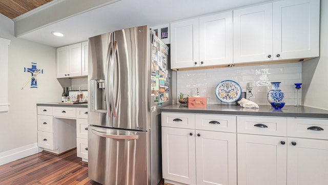 405 N Grace St N, Houston, TX 77003 - kitchen with stainless steel fridge, baseboards, dark wood finished floors, dark countertops, and recessed lighting