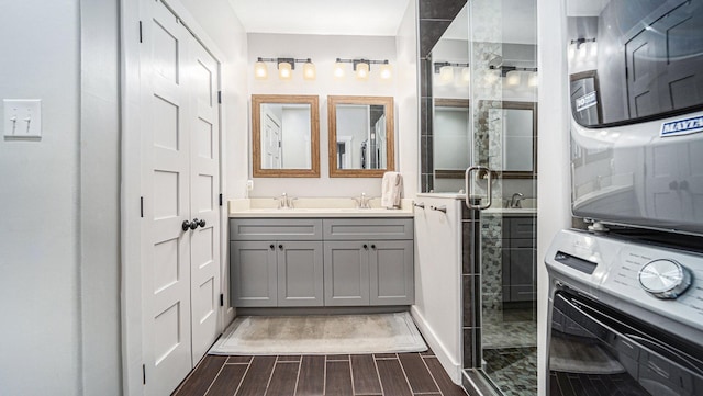 405 N Grace St N, Houston, TX 77003 - full bathroom with wood finished floors, a shower stall, and vanity