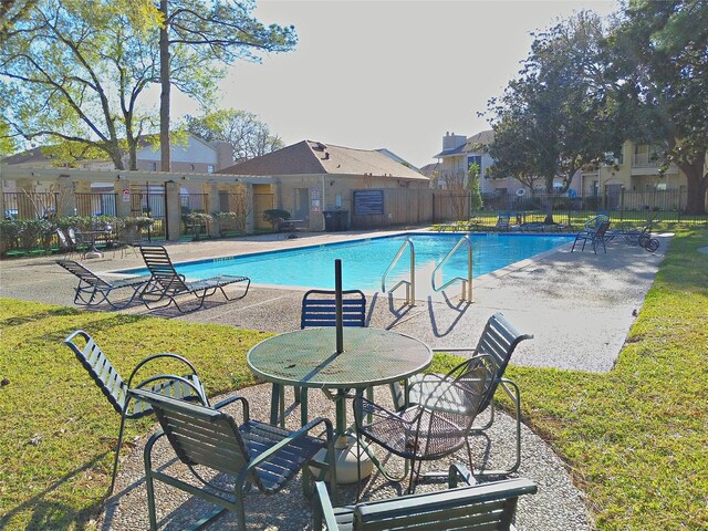 800 Country Place Dr Unit 909, Houston, TX 77079 - community pool with a patio