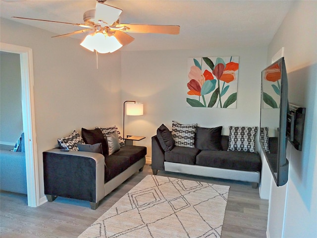 800 Country Place Dr Unit 909, Houston, TX 77079 - living room featuring light wood finished floors and ceiling fan