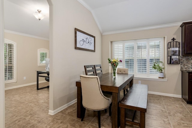23118 Mestina Knoll Dr, Porter, TX 77365 - dining room featuring ornamental molding, baseboards, vaulted ceiling, and light tile patterned floors