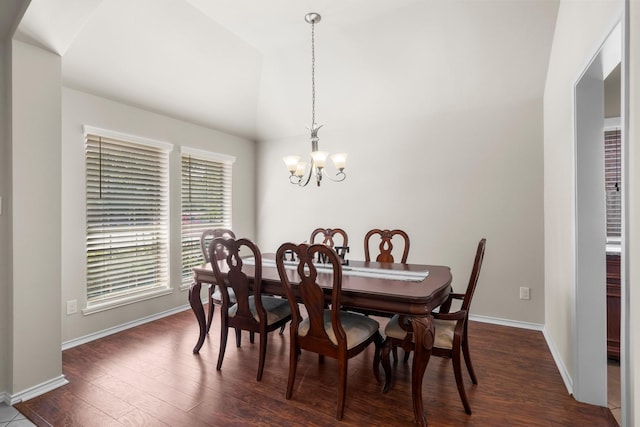31870 Forest Park Trl, Conroe, TX 77385 - dining room with a chandelier, dark wood-style flooring, baseboards, and lofted ceiling