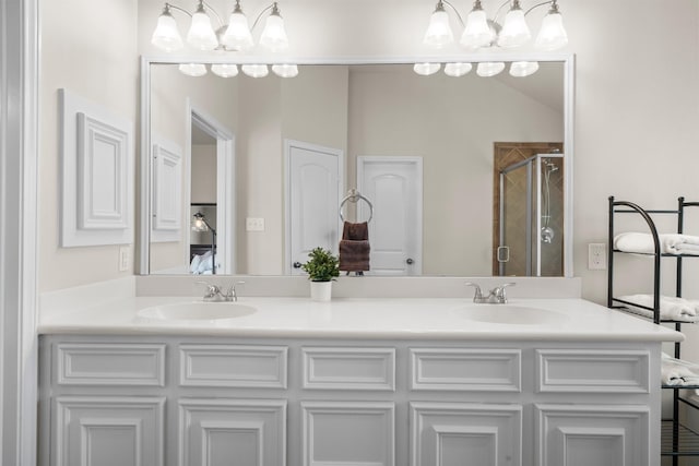 31870 Forest Park Trl, Conroe, TX 77385 - full bath featuring double vanity, a stall shower, and a chandelier