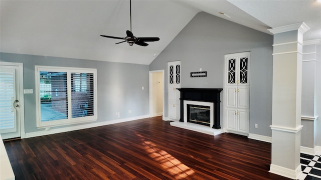 53 S Calla Lily Ct, Lake Jackson, TX 77566 - unfurnished living room featuring ceiling fan, wood finished floors, a glass covered fireplace, high vaulted ceiling, and decorative columns