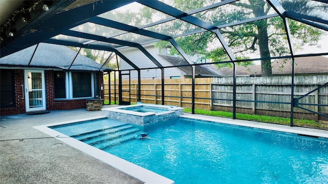 53 S Calla Lily Ct, Lake Jackson, TX 77566 - view of pool with a lanai, a patio area, and a pool with connected hot tub