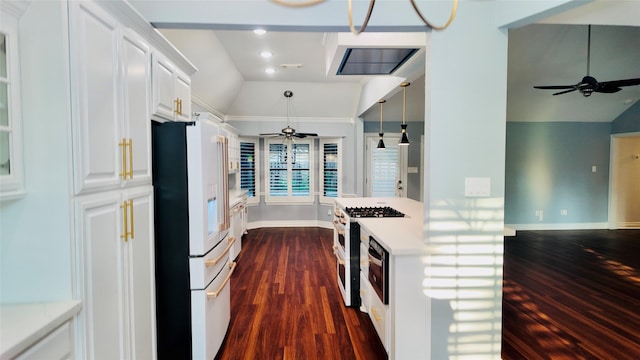 53 S Calla Lily Ct, Lake Jackson, TX 77566 - kitchen featuring ceiling fan, high end appliances, dark wood-type flooring, lofted ceiling, and baseboards