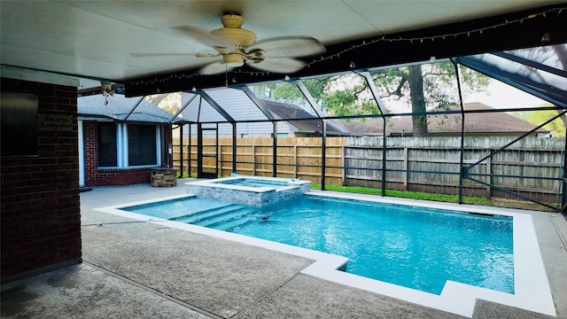 53 S Calla Lily Ct, Lake Jackson, TX 77566 - view of swimming pool with a lanai, a patio, a pool with connected hot tub, and a ceiling fan