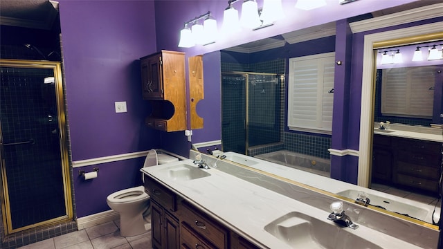 53 S Calla Lily Ct, Lake Jackson, TX 77566 - full bathroom featuring a stall shower, tile patterned flooring, ornamental molding, toilet, and double vanity