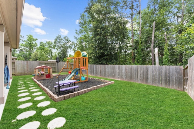 1164 Clonmore Ct, Conroe, TX 77304 - view of yard with a playground
