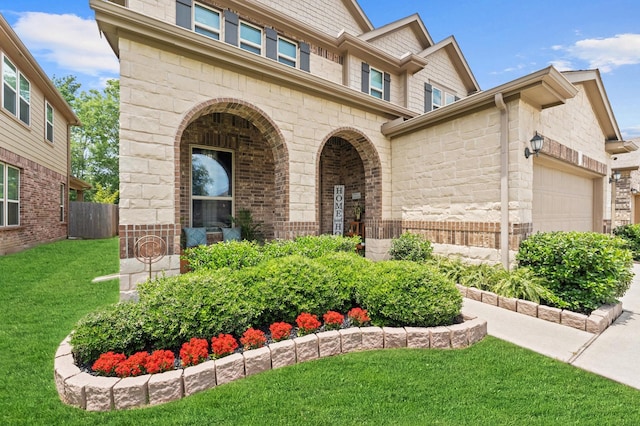 1164 Clonmore Ct, Conroe, TX 77304 - view of front of property featuring stone siding, a garage, and brick siding