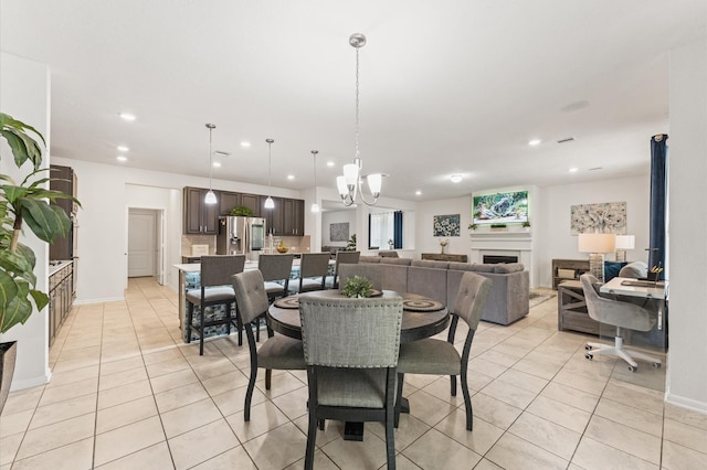 1164 Clonmore Ct, Conroe, TX 77304 - dining area featuring recessed lighting, light tile patterned floors, a chandelier, and baseboards