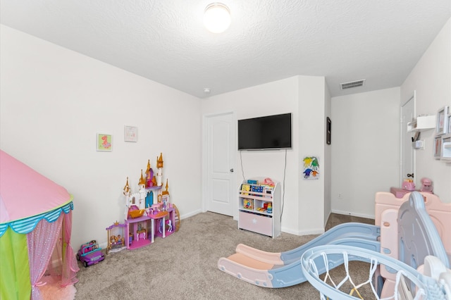 1164 Clonmore Ct, Conroe, TX 77304 - rec room featuring carpet flooring and a textured ceiling