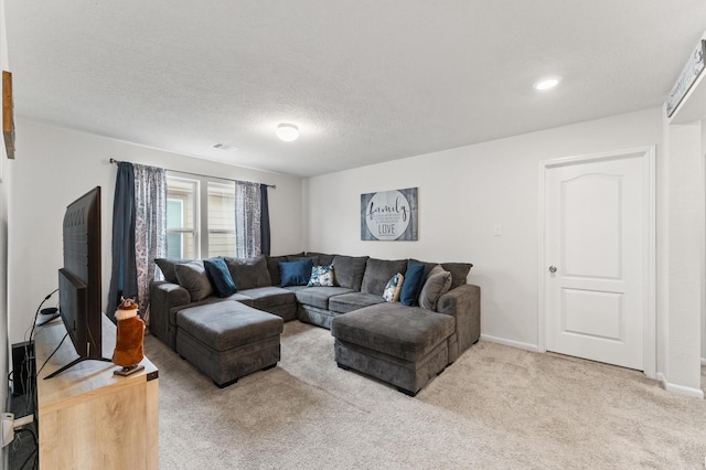 1164 Clonmore Ct, Conroe, TX 77304 - living area with light carpet, baseboards, and a textured ceiling