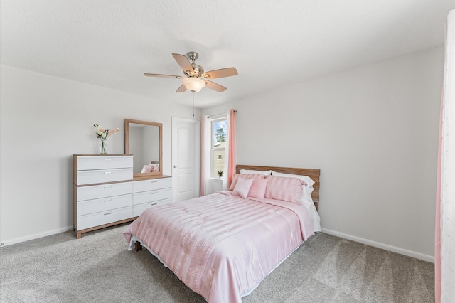 1164 Clonmore Ct, Conroe, TX 77304 - bedroom with light colored carpet, baseboards, and a ceiling fan