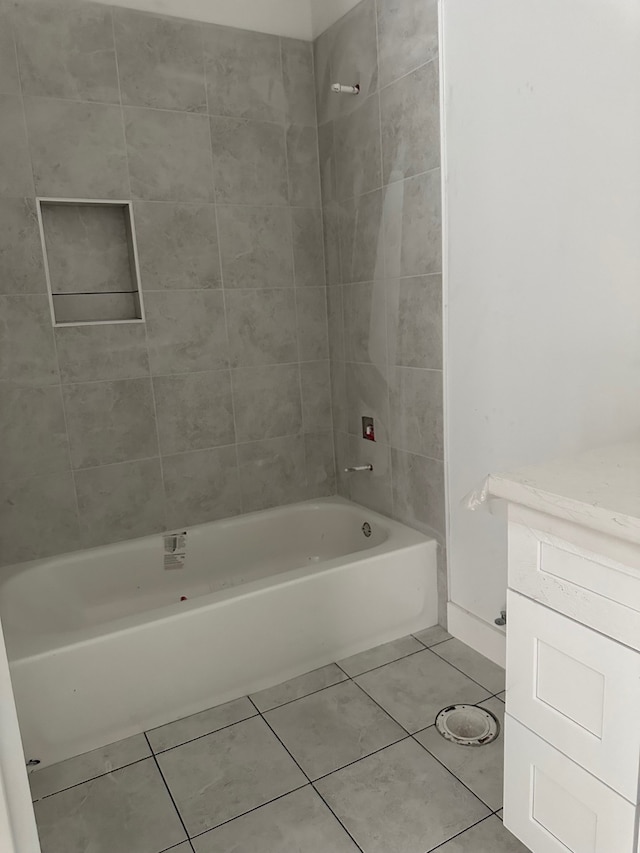 1934 Wildpacher Ln, Houston, TX 77080 - bathroom featuring tile patterned floors, washtub / shower combination, and vanity