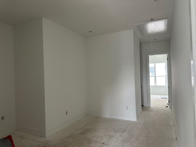 1934 Wildpacher Ln, Houston, TX 77080 - spare room featuring attic access and baseboards
