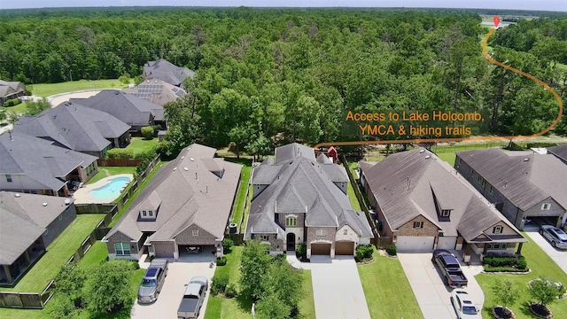 31297 New Forest Park Ln, Spring, TX 77386 - aerial view of residential area with a forest