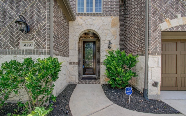 31297 New Forest Park Ln, Spring, TX 77386 - entrance to property with stone siding and brick siding