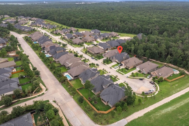 31297 New Forest Park Ln, Spring, TX 77386 - aerial overview of property's location featuring a forest and nearby suburban area