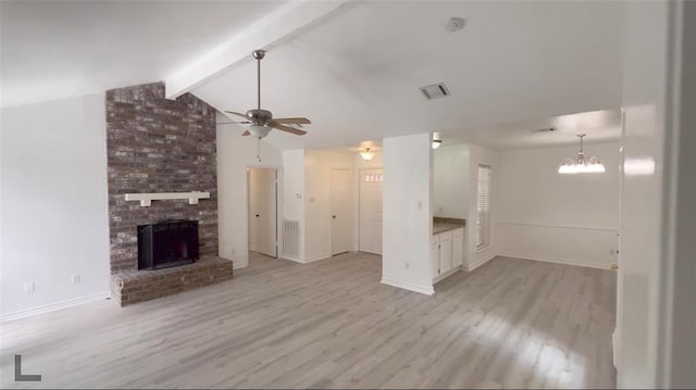 1419 Valley Landing Dr, Katy, TX 77450 - unfurnished living room featuring a ceiling fan, light wood-style floors, baseboards, and a fireplace