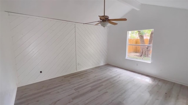 1419 Valley Landing Dr, Katy, TX 77450 - empty room featuring wood finished floors, baseboards, ceiling fan, and wooden walls