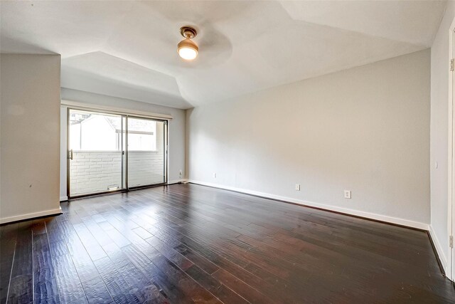 825 W 16th St Unit A, Houston, TX 77008 - spare room with baseboards, dark wood finished floors, vaulted ceiling, and ceiling fan