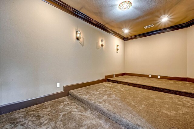 825 W 16th St Unit A, Houston, TX 77008 - unfurnished room with carpet, crown molding, baseboards, recessed lighting, and a textured ceiling