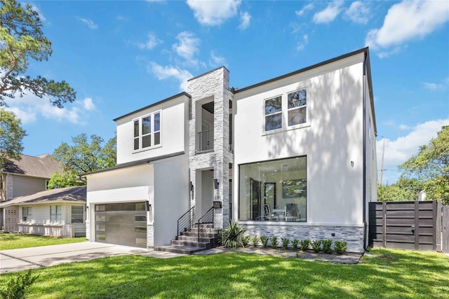 2310 Althea Dr, Houston, TX 77018 - contemporary home featuring stone siding, a garage, driveway, and stucco siding