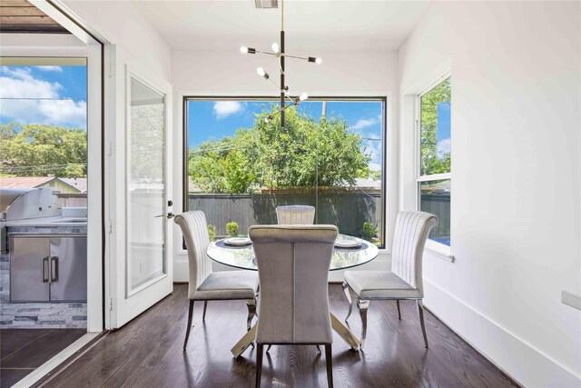 2310 Althea Dr, Houston, TX 77018 - dining space with a chandelier and wood finished floors