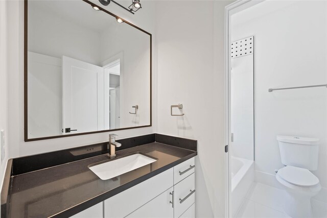 2310 Althea Dr, Houston, TX 77018 - bathroom featuring vanity, toilet, and shower / washtub combination