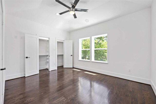2310 Althea Dr, Houston, TX 77018 - unfurnished bedroom with multiple closets, baseboards, and wood finished floors